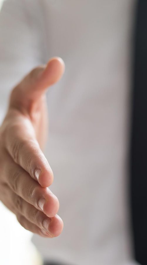 businessman-offering-hand-handshake